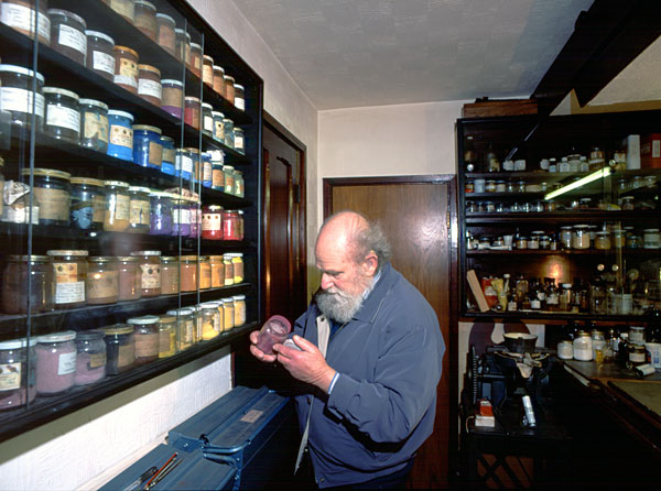 Anthony Brandt in his paint store room